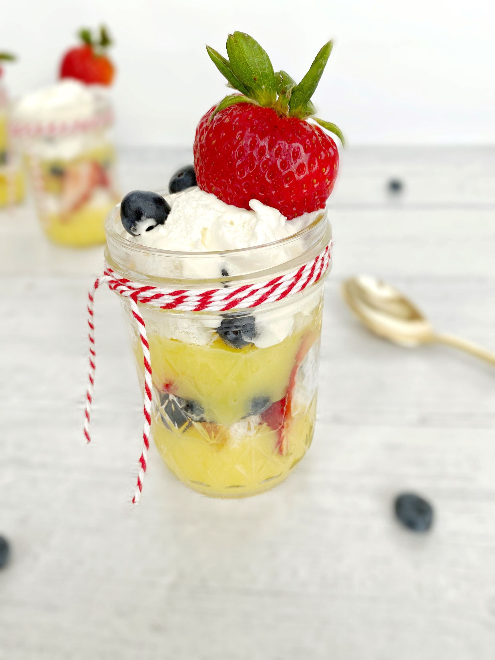 no-bake summer berry trifle in a mason jar