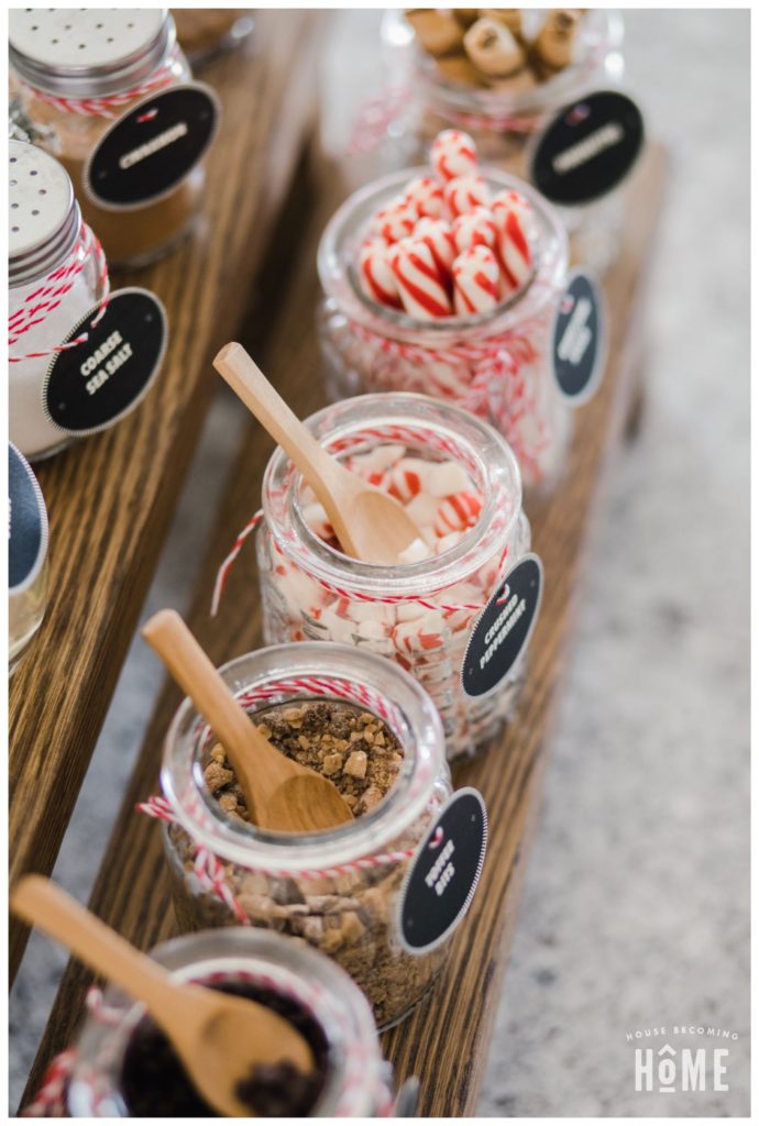 Jars filled with candies and chocolats for a hot cocoa bar