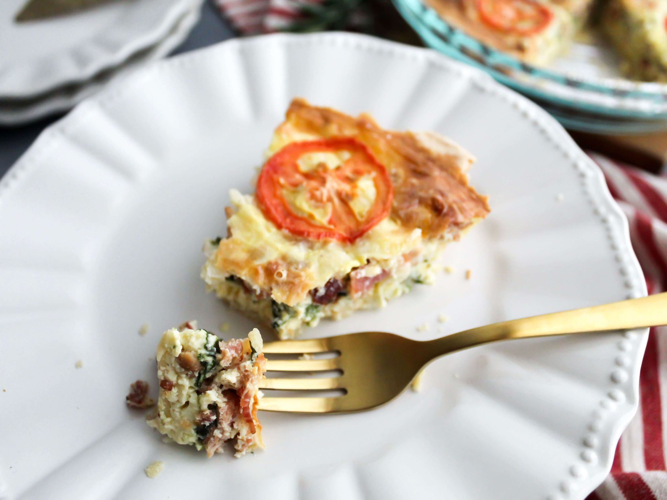 Fork with bite on the end of easy Christmas Quiche 