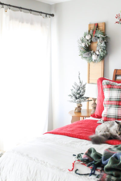 Decorating our bedroom for Christmas using red, gold and white decor with plaid holiday bedding