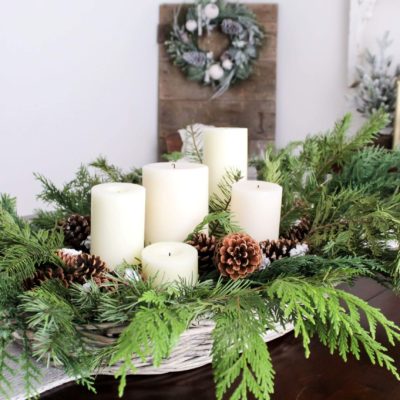 DIY Centerpiece With Greenery And Pinecones