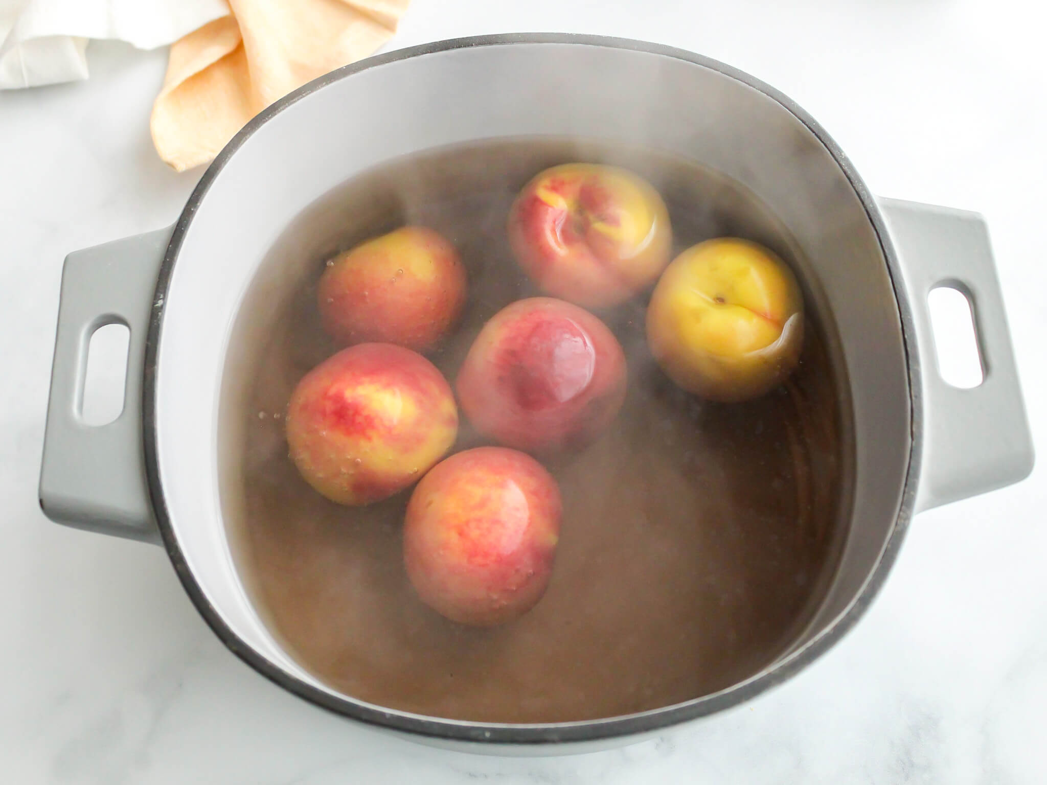 Blanching Peaches for Strawberry Peach Crisp