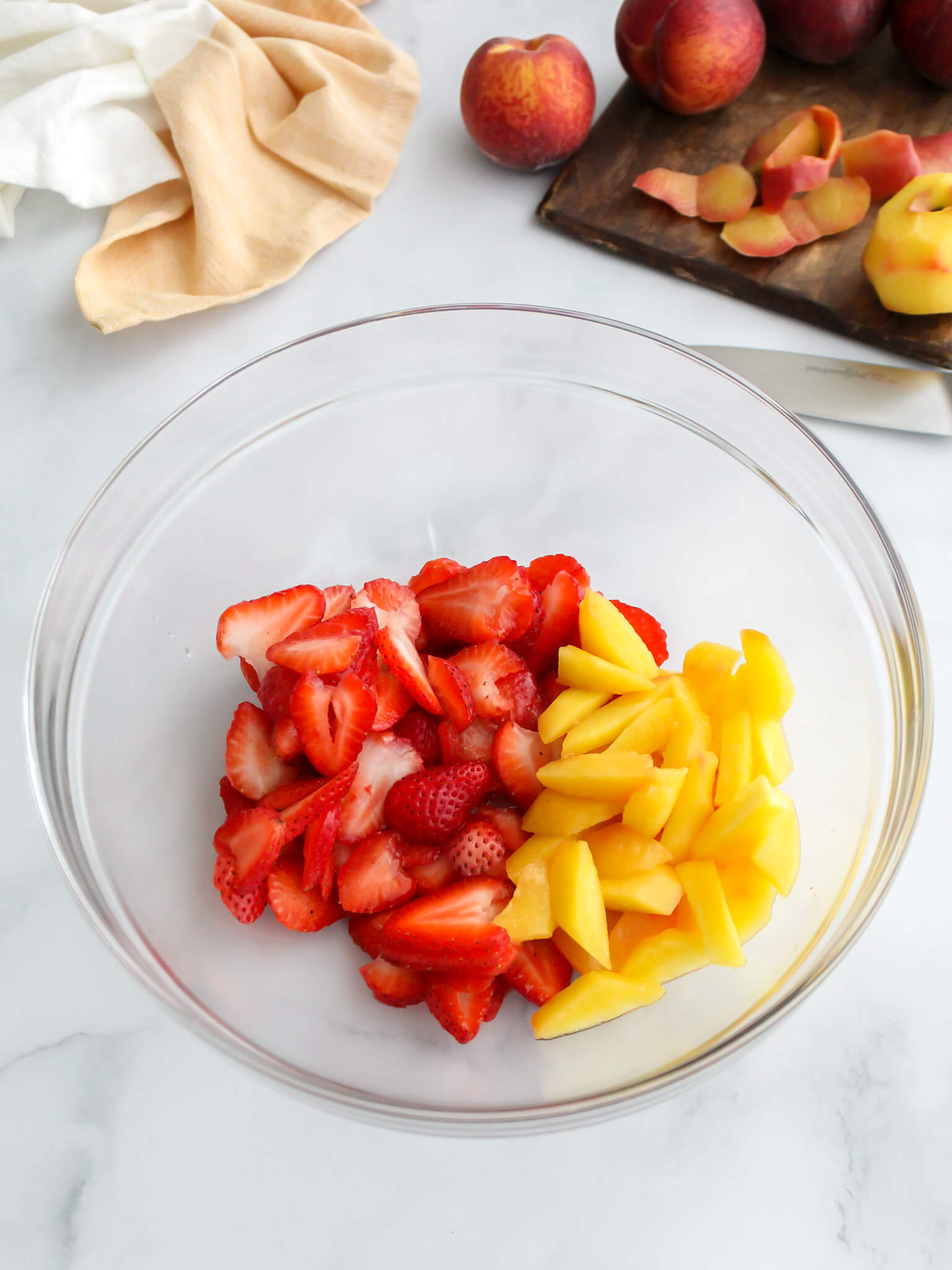 Bowl of Diced Peaches and Strawberries for Crisp