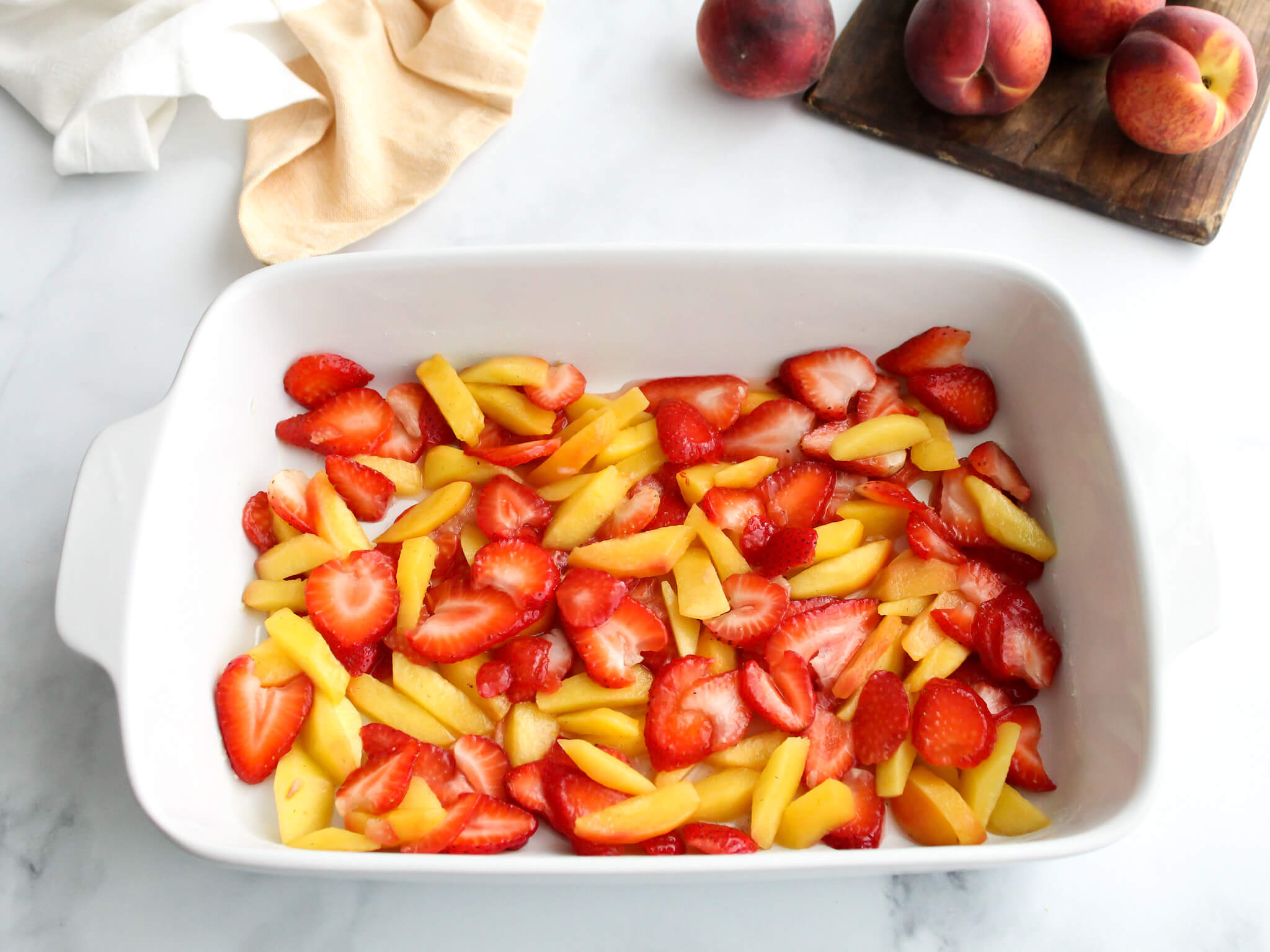 Baking Pan of Fruit Filling for StrawberryPeach Crisp