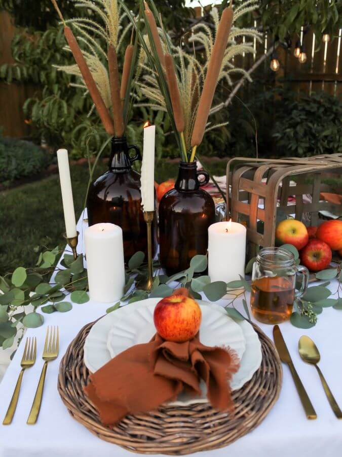 Cat Tails with Pampas Grass and Fall Apples in Picnic Basket for Centerpiece for Boho Picnic - Midwest Life and Style Blog