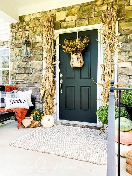 Farmhouse Front Porch with Pew and Pumpkins - Midwest Life and Style Blog