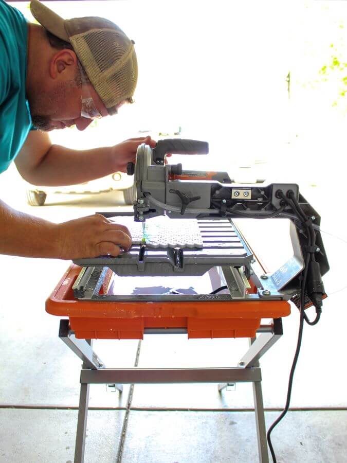 Using A Wet Tile Saw To Cut Herringbone Mosaic Tile for Kitchen Backsplash- Midwest Life and Style BlogCutting Herringbone Mosaic Tile for Kitchen Backsplash- Midwest Life and Style Blog