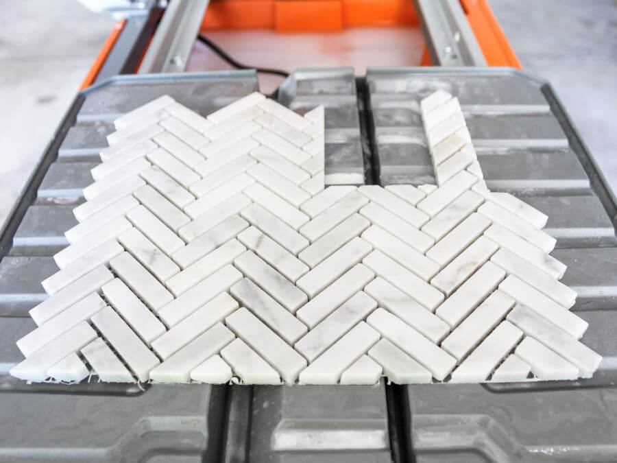 Using A Wet Tile Saw To Cut Herringbone Mosaic Tile for Kitchen Backsplash- Midwest Life and Style BlogCutting Herringbone Mosaic Tile for Kitchen Backsplash- Midwest Life and Style Blog