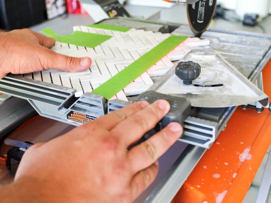 Using A Wet Tile Saw To Cut Herringbone Mosaic Tile for Kitchen Backsplash- Midwest Life and Style BlogCutting Herringbone Mosaic Tile for Kitchen Backsplash- Midwest Life and Style Blog