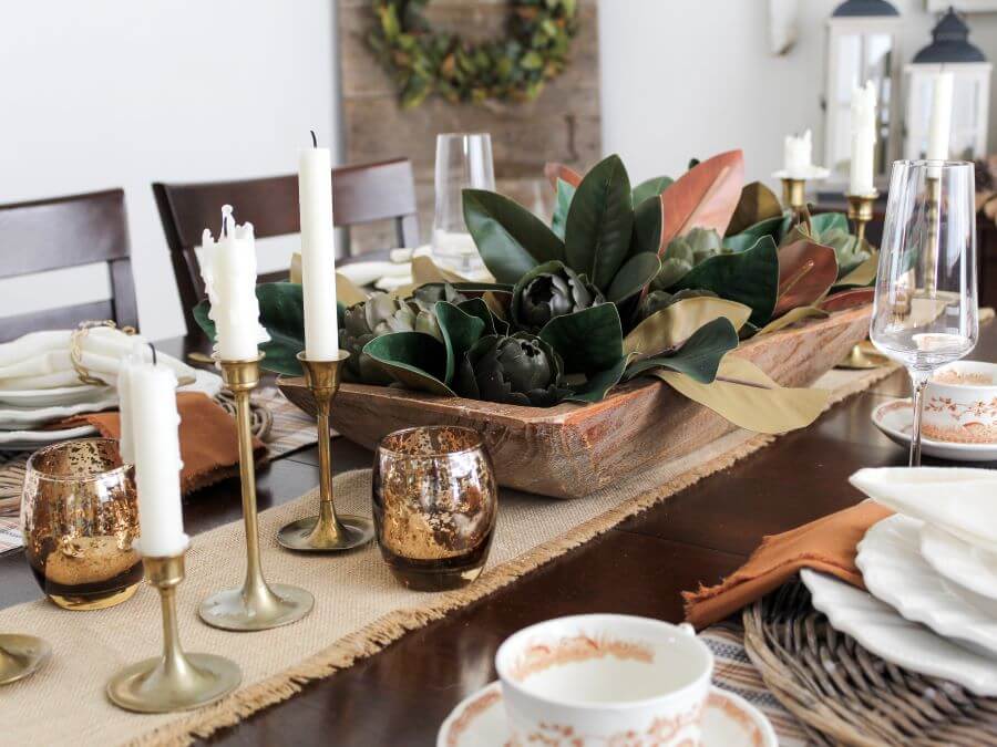 Thanksgiving Centerpiece with Dough Bowl, Magnolia Leaves, Brass Candlesticsk and Votive Candles - Midwest Life and Style Blog