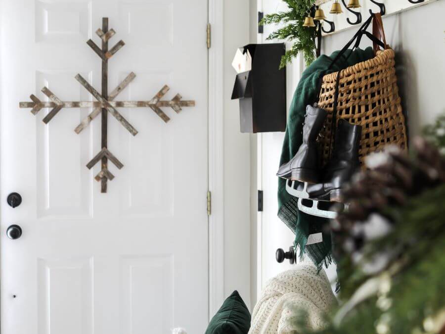 Christmas Entry with Gold Bell Garland and Vintage Ice Skates - 5 Simple Ways To Get Ready For Christmas Now - Midwest Life and Style Blog