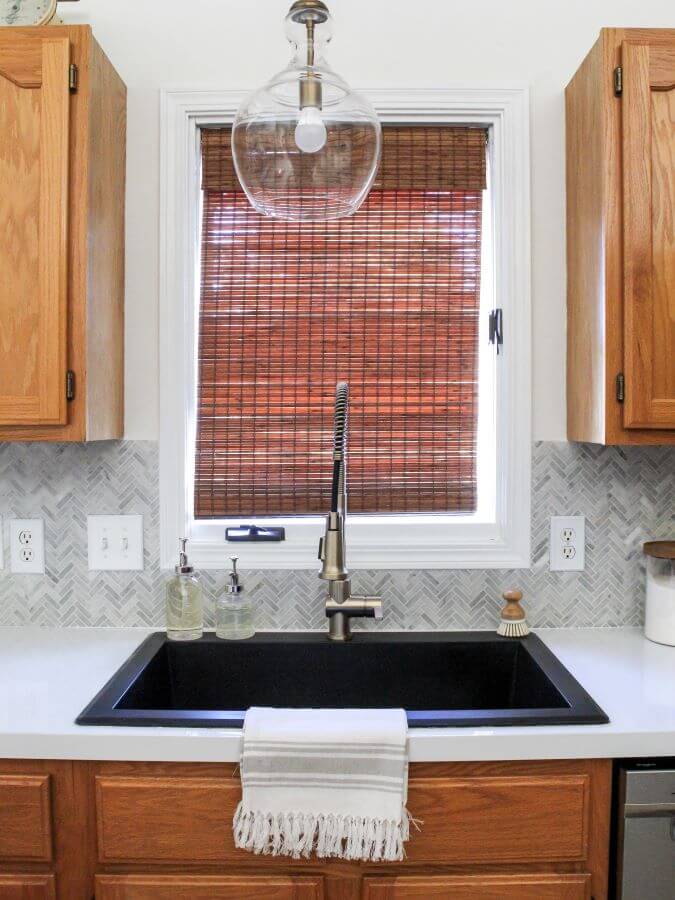 Granite single bowl black kitchen sink with brushed brass high arch faucet - Midwest Life and Style Blog