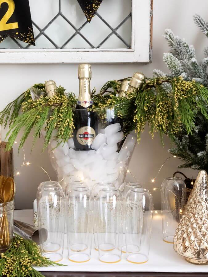 Mini Prosecco Bottles on Ice with Greenery for Festive NYE Party - Midwest Life and Style Blog