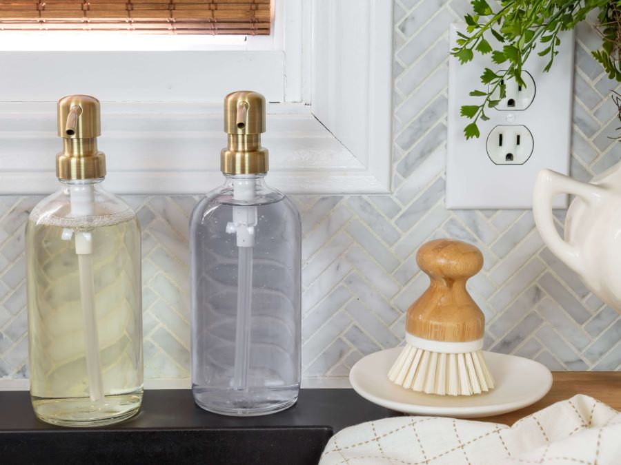 Styling a kitchen sink with brass soap dispenser and bamboo scrubber - Midwest Life and Style Blog