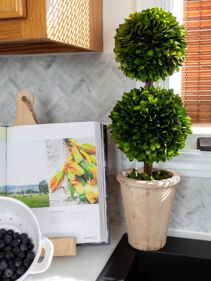 Styling a preserved boxwood topiary on kitchen counter for spring - Midwest Lif and Style Blog