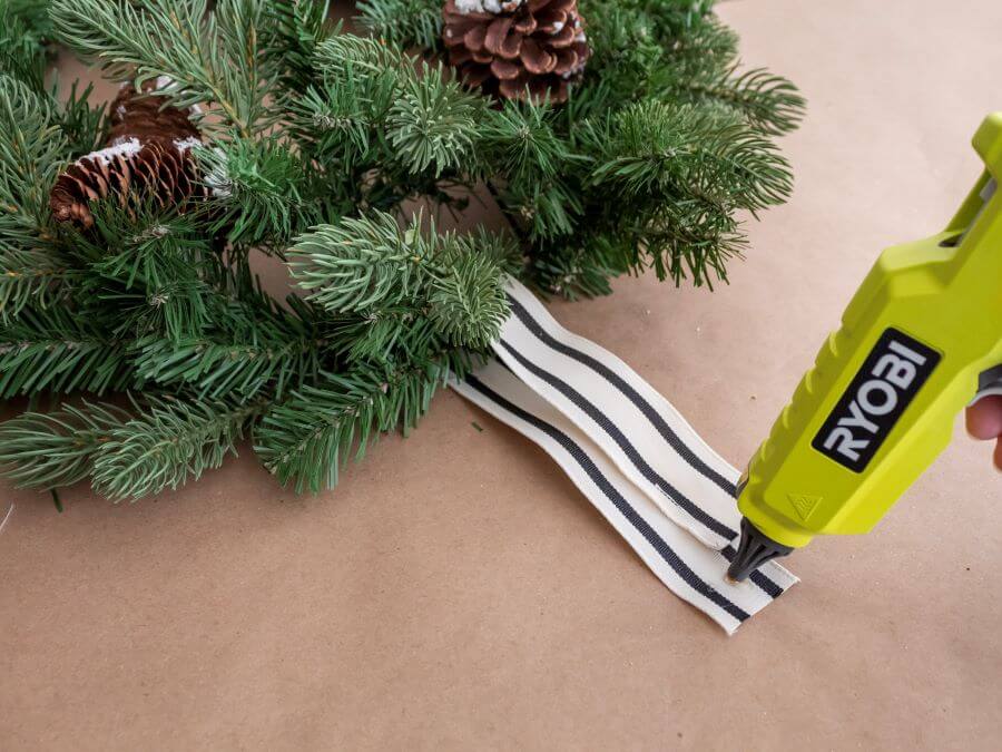 Glue the Balck and White Striped Ribbon for the Winter Wreath Hanger - Midwest Life and Style Blog