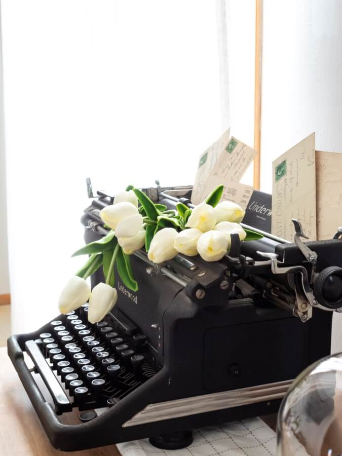 Vintage typewriter with tulips for spring  - Midwest Life and Style Blog