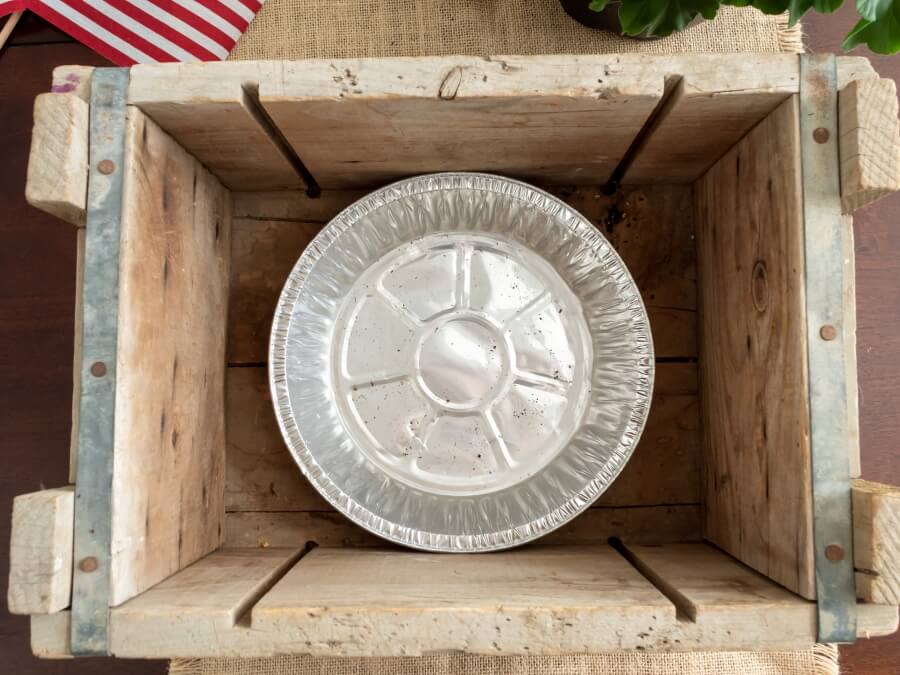 Pie Tin in the Botton of a Vintage Wood Crate for a Flower Planter