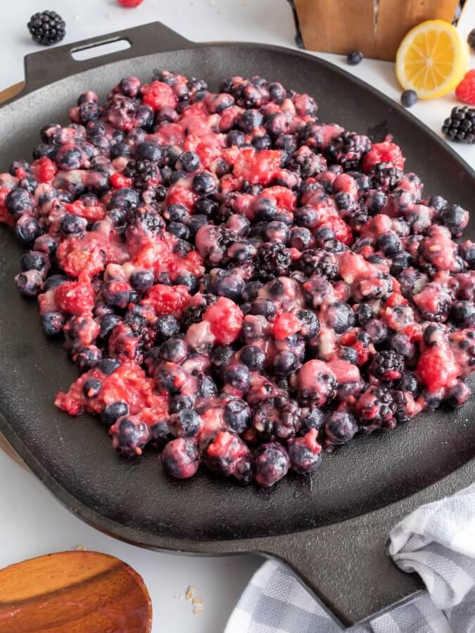 Adding the Berry Filling to the Pampered Chef Sizzle Skillet - Midwest Life and Style Blog