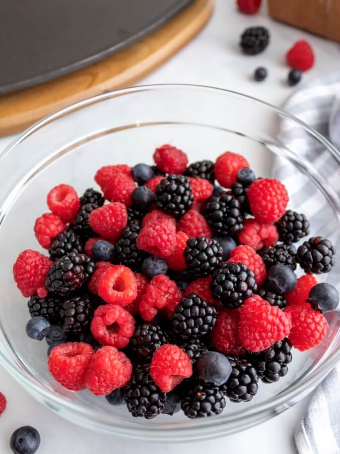 Bowl of Fresh Raspberries, Blackberries, and Blueberries for Crisp - Midwest Life and Style Blog