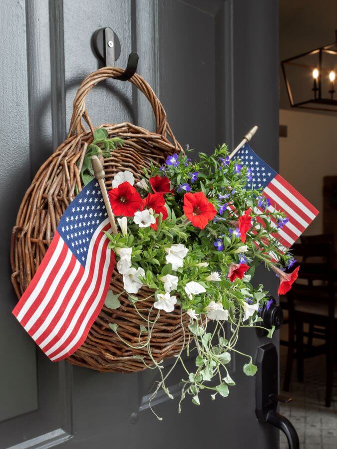 How To Create Patriotic Hanging Door Basket Decorations Filled with Red, White and Blue Annuals and American Flags