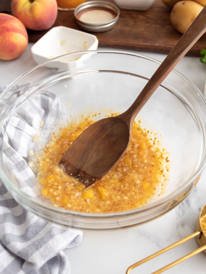 Mixing up the peach freezer jam, mustard and garlic to make pork tenderloin glaze - Midwest Life and Style Blog