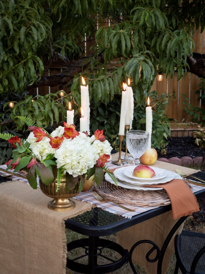 Fall Garden Party Tablescape with Brass Candlesticks, Flowers, and Apples - Midwest Life and Style Blog