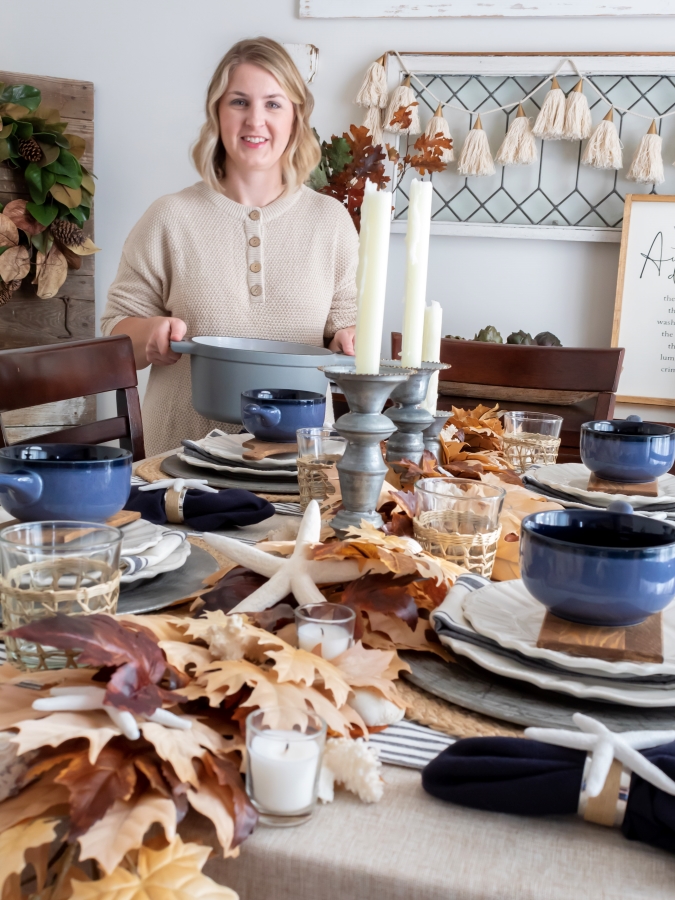 Jen Svendsen - Blogger at Midwest Life and Style standing in her driing room decorated for fall