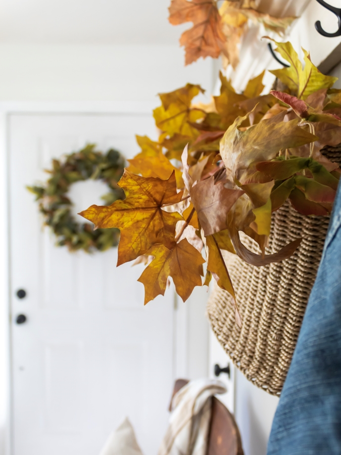 Fall Stems in Straw Basket in Cottage Style Entryway Decorated for Autumn - Midwest Life and Style Blog