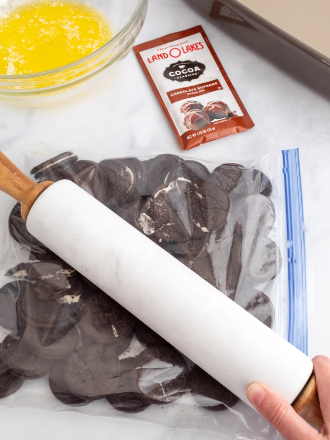 Crushing Oreos for the Icebox Cake Bottom Layer - Midwest Life and Style Blog