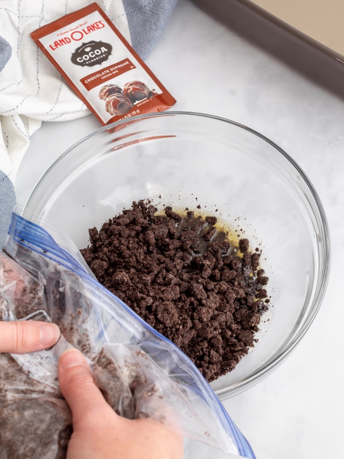 Crushing Oreos for the Icebox Cake Bottom Layer - Midwest Life and Style Blog