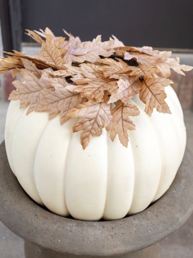 Hot Gluing on Fuax Fall Leaves - How To Make A Stacked Pumpkin Topiary 