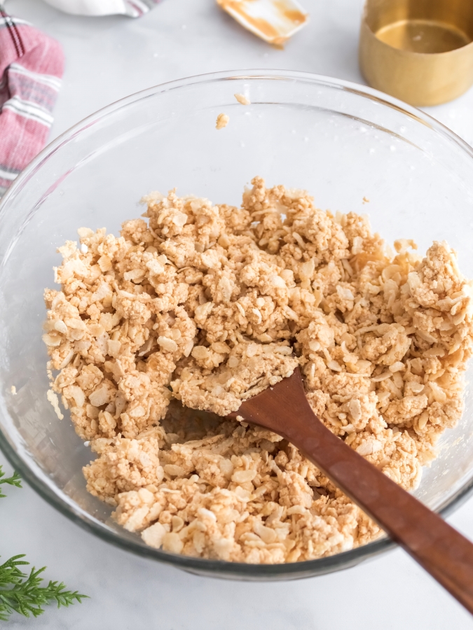 Mixing up Christmas Peanut Butter Balls 