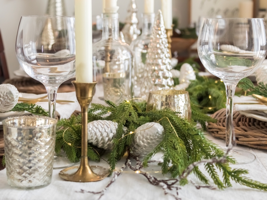 Winter Greenery on Table with Twinkle Lights and Brass Candlesticks - Midwest Life and Style Blog