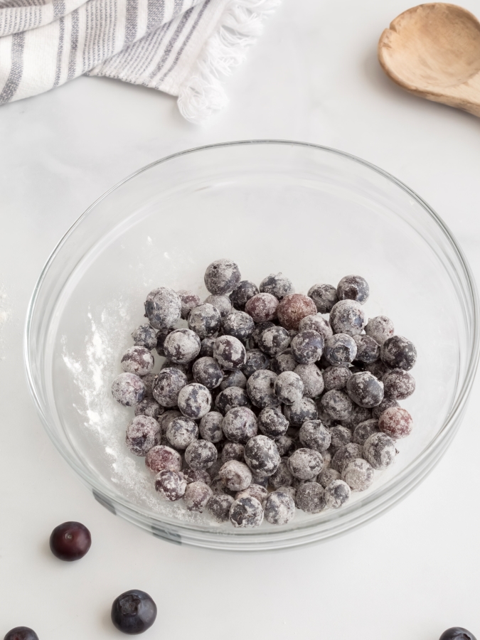 Adding Flour to Blueberries before adding to Coffee Cake Batter - Midwest Life and Style Blog