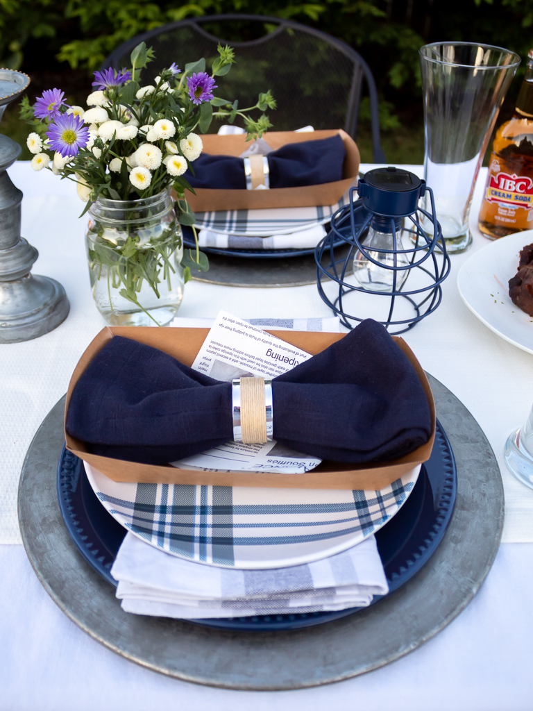 Napkin Folded in the Shape of a Bowtie for Father's Day Outdoor Tablescape - Midwest Life and Style Blog