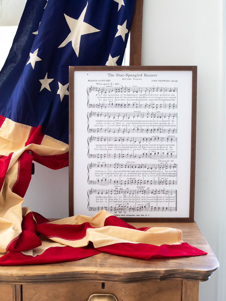 The Star Spangled Banner framed lyrics draped with a vintage American Flag for the 4th of July - Midwest Life and Style Blog