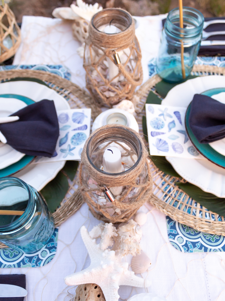 Tropical Cocktail Party Tablescape Centerpiece with Coastal Candle Holders, Seashells and Driftwood - Midwest Life and Style 