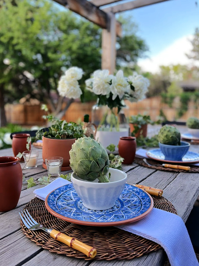 Outdoor Summer Tablescape with TErra Cotta, Blue, and Artichokes - 15 Creative Summer DIY Projects To Try Now - Midwest Life and Style Blog