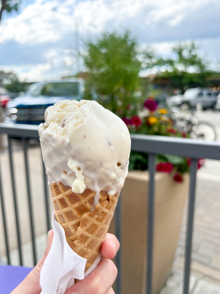 Butter pecan ice cream in a waffle cone from Walrus ice cream shop in Fort Collins