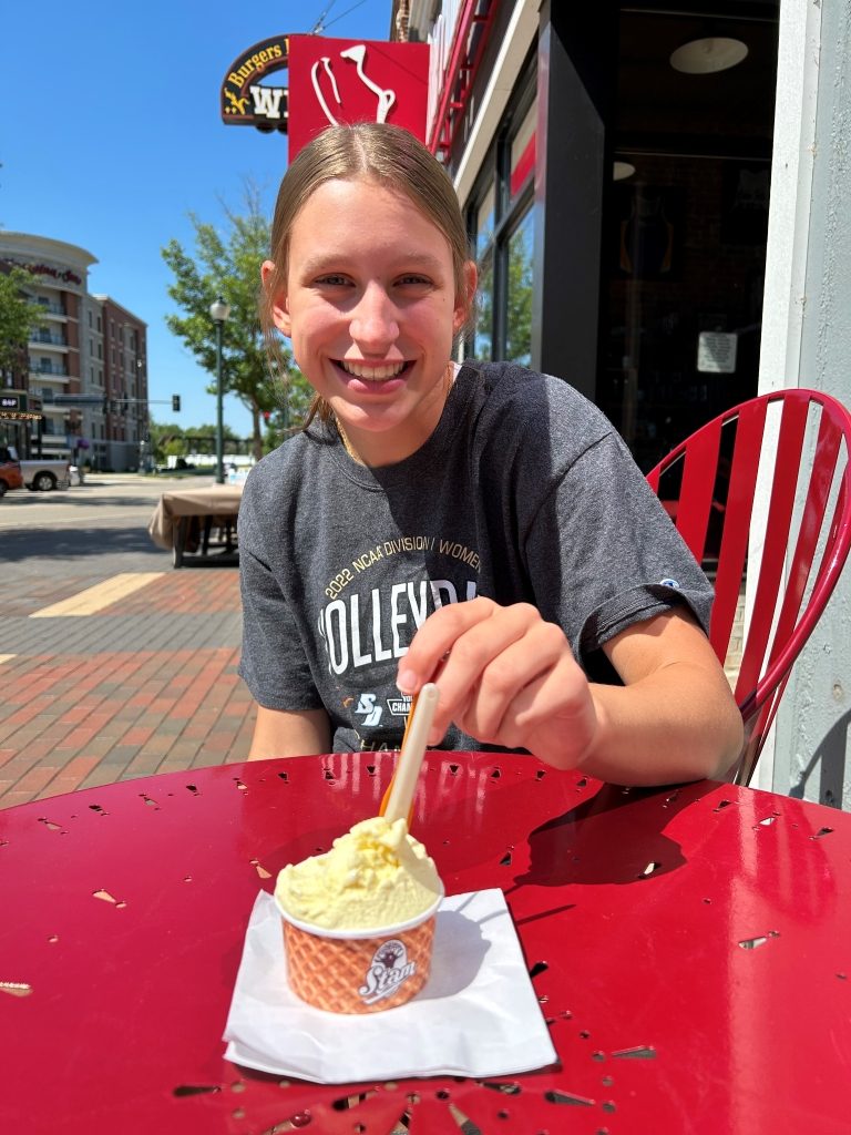 Enjoying some gelato from Stam's chocolate shop in downton Cedar Falls Iowa