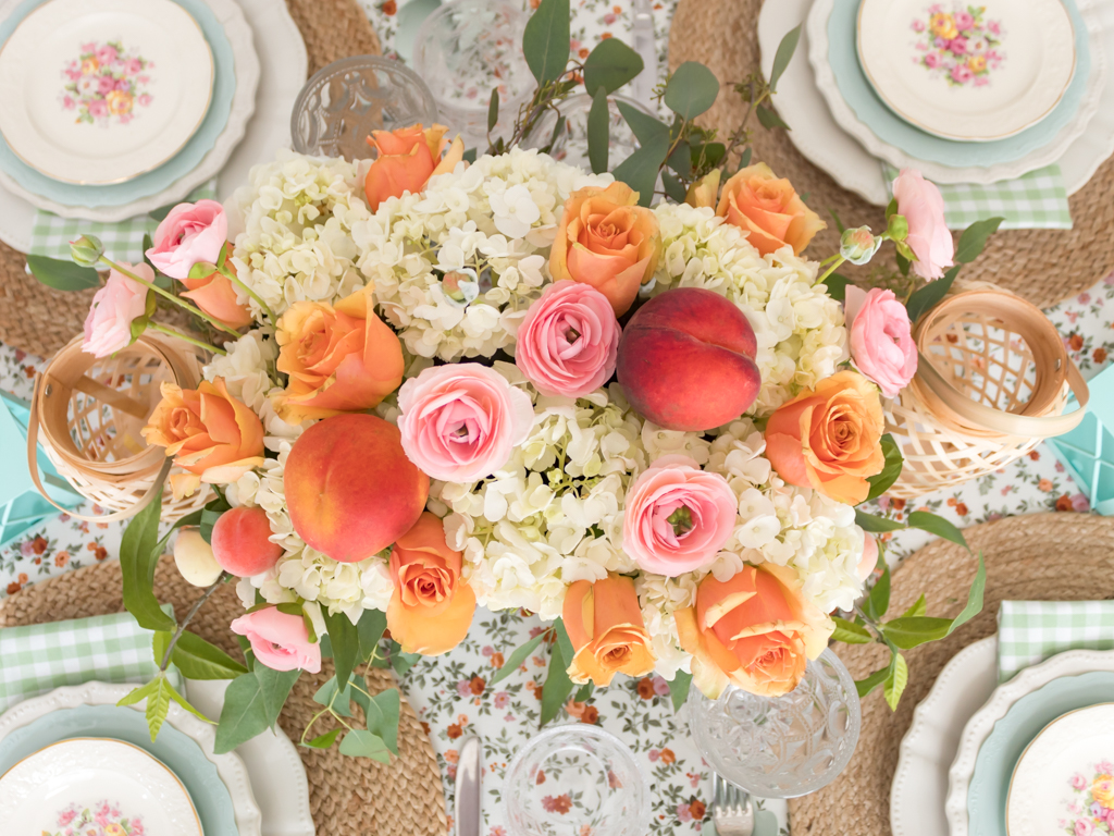 Peach-themed summer tablescape with pastels, floral centerpiece, and vintage china - Midwest Life and Style Blog