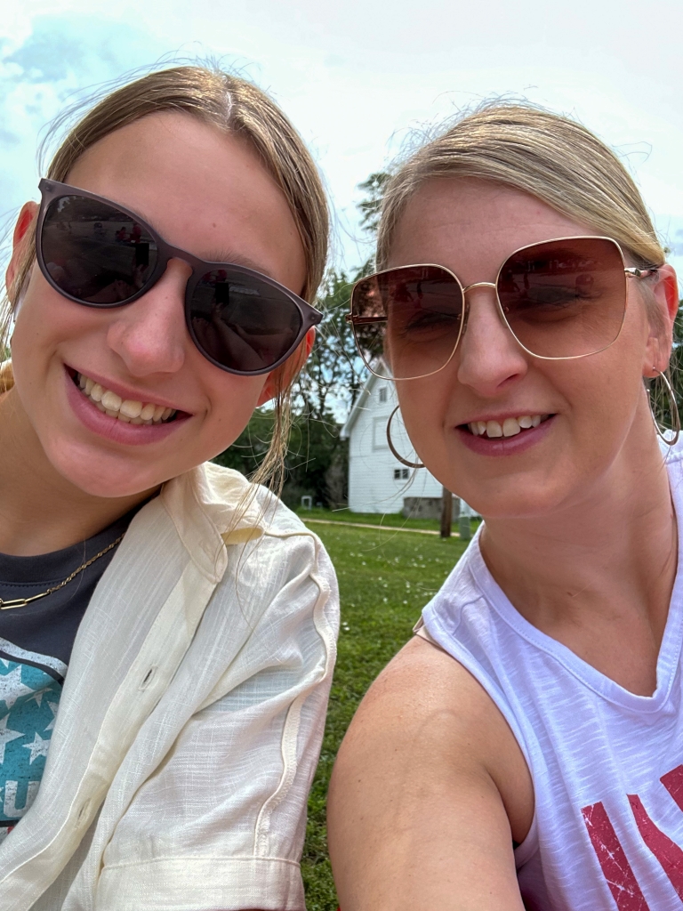 Peyton and I waiting for the parade to start on teh 4th of July 