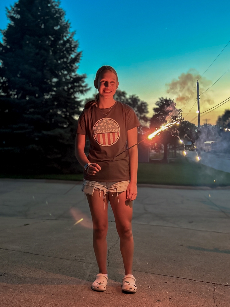 Peyton with a sparkler on July 4th 