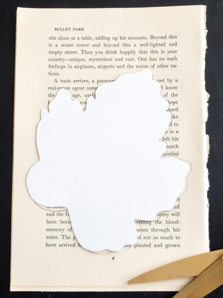 Tracing a Leaf Stencil onto an Old Book Page to Make a Fall Garland - Midwest Life and Style Blog