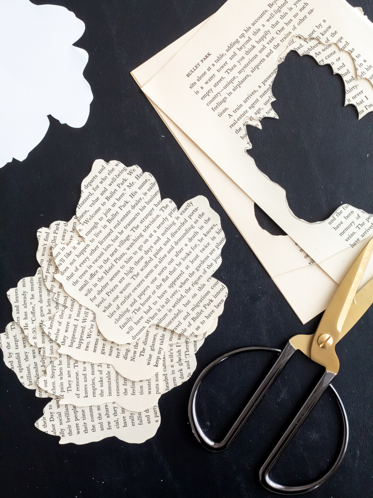 Cutting Leaf Shapes Out of Old Books for a Fall Craft - Midwest Life and Style Blog