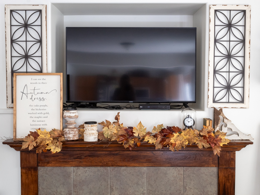 Fireplace Mantel with fall garland and fall sign