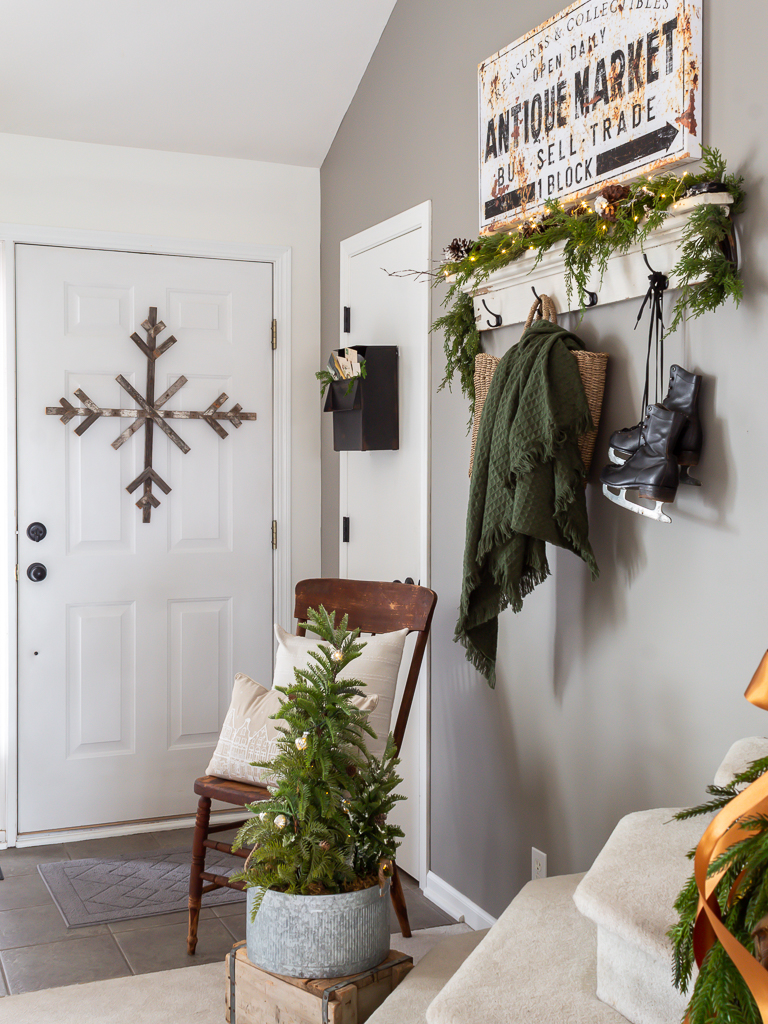 Cottage-inspired entry decorated for Christmas