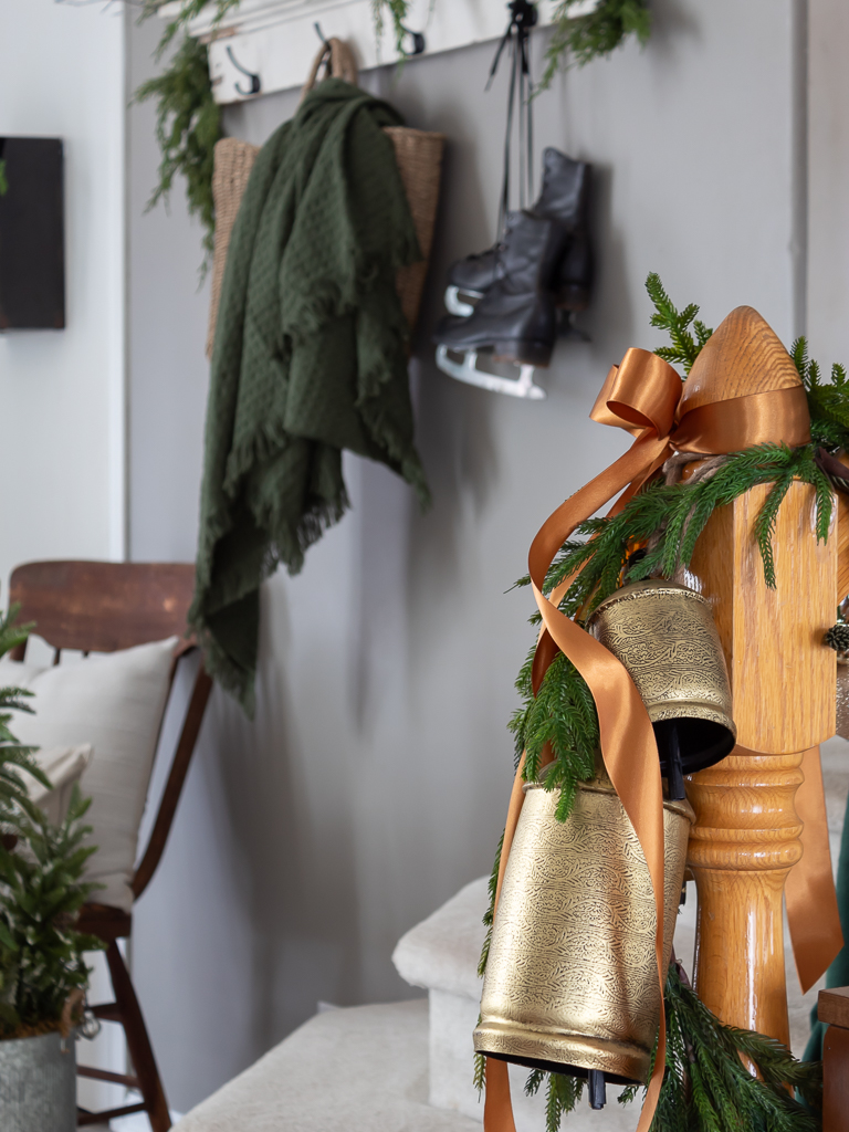 Rusitc Bell and Garland on Staircase