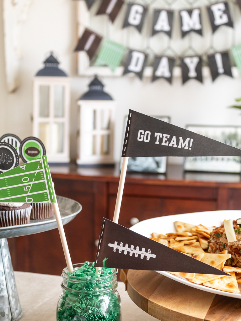 Free green, black, and white printable party pennants for a football-themed party